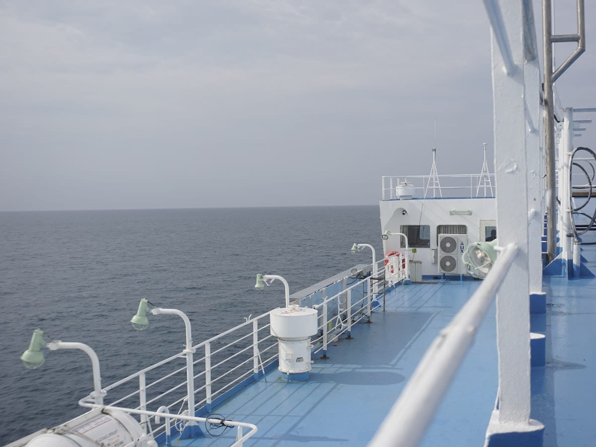 Deck of a ship sailing on a calm sea