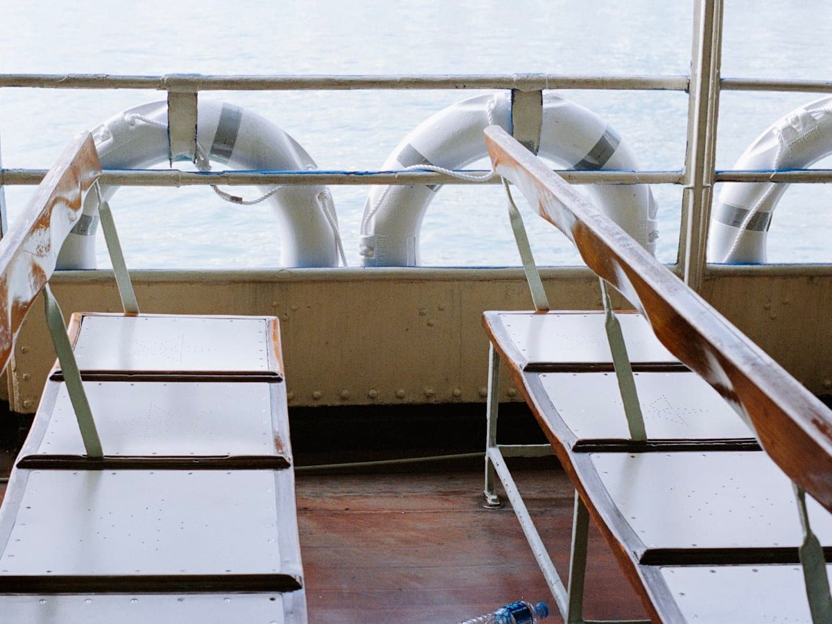 Two sets of stairs leading towards the ocean.