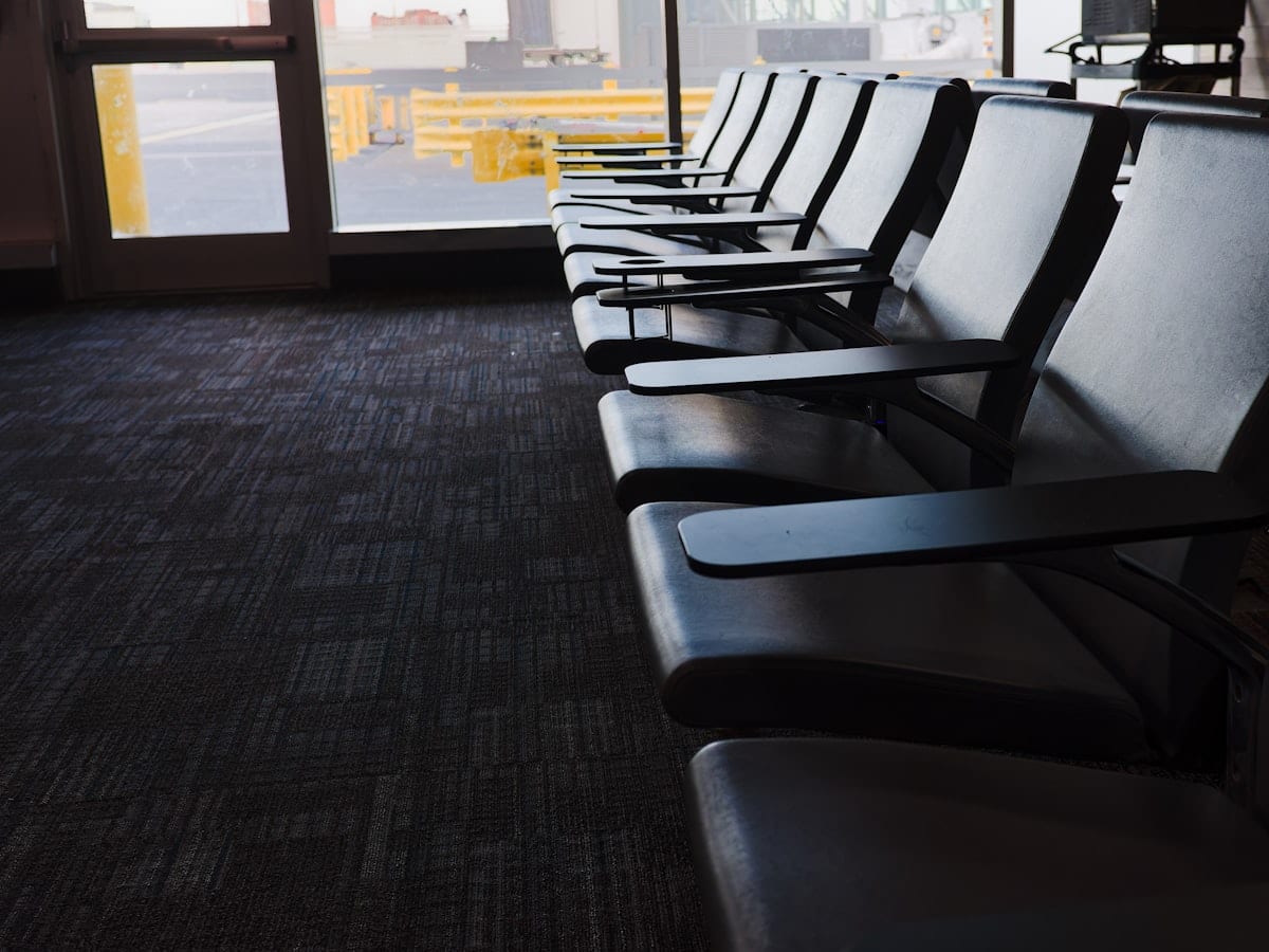 a row of empty seats in a waiting area