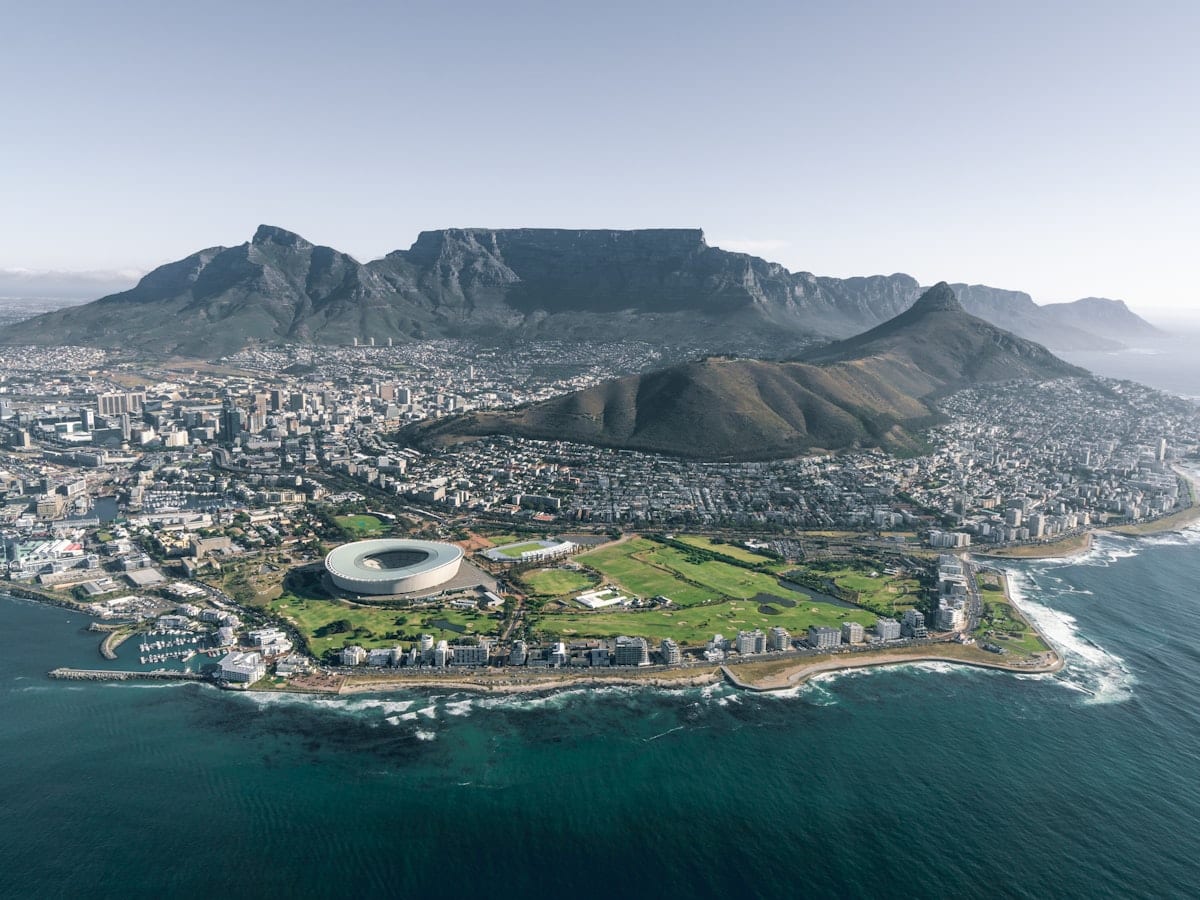 aerial view of city near mountain during daytime