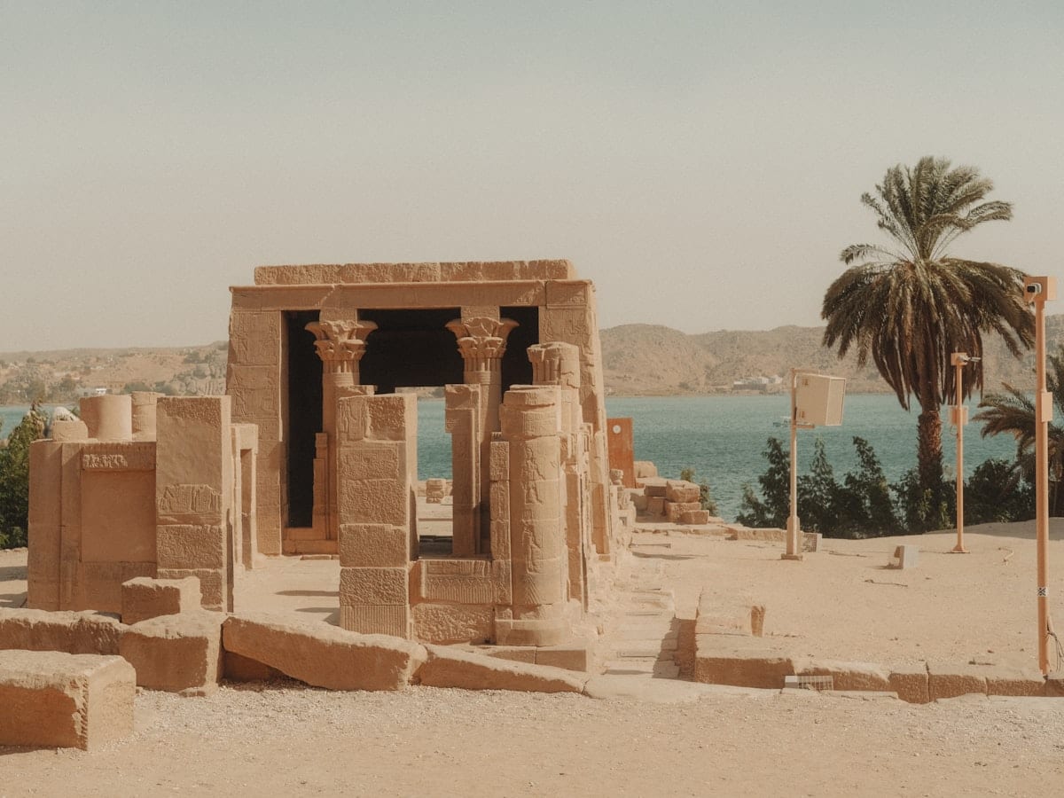 Ancient egyptian temple ruins by the nile river