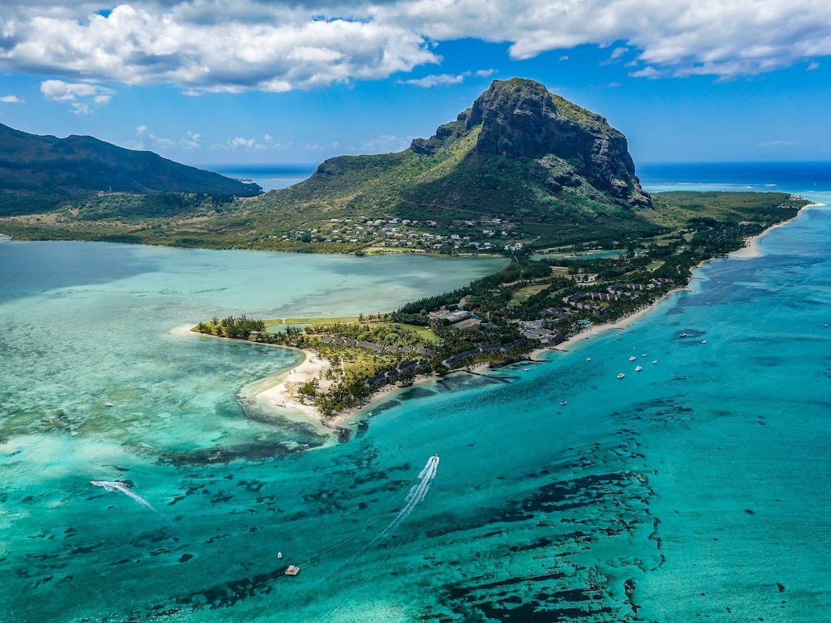 aerial photography of island beside body of water
