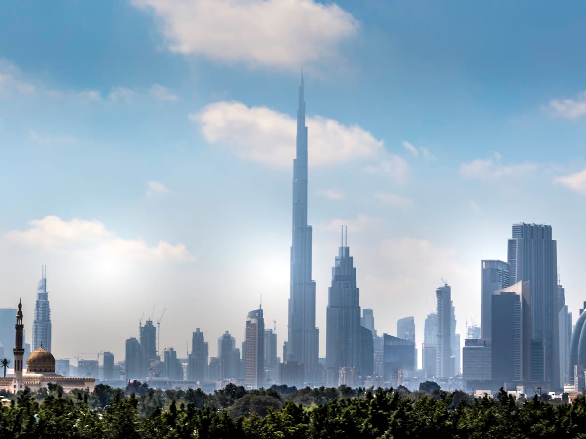 a view of a city with tall buildings